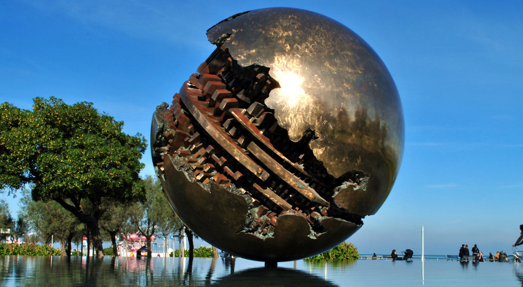 Arnaldo Pomodoro sculpture on the lake